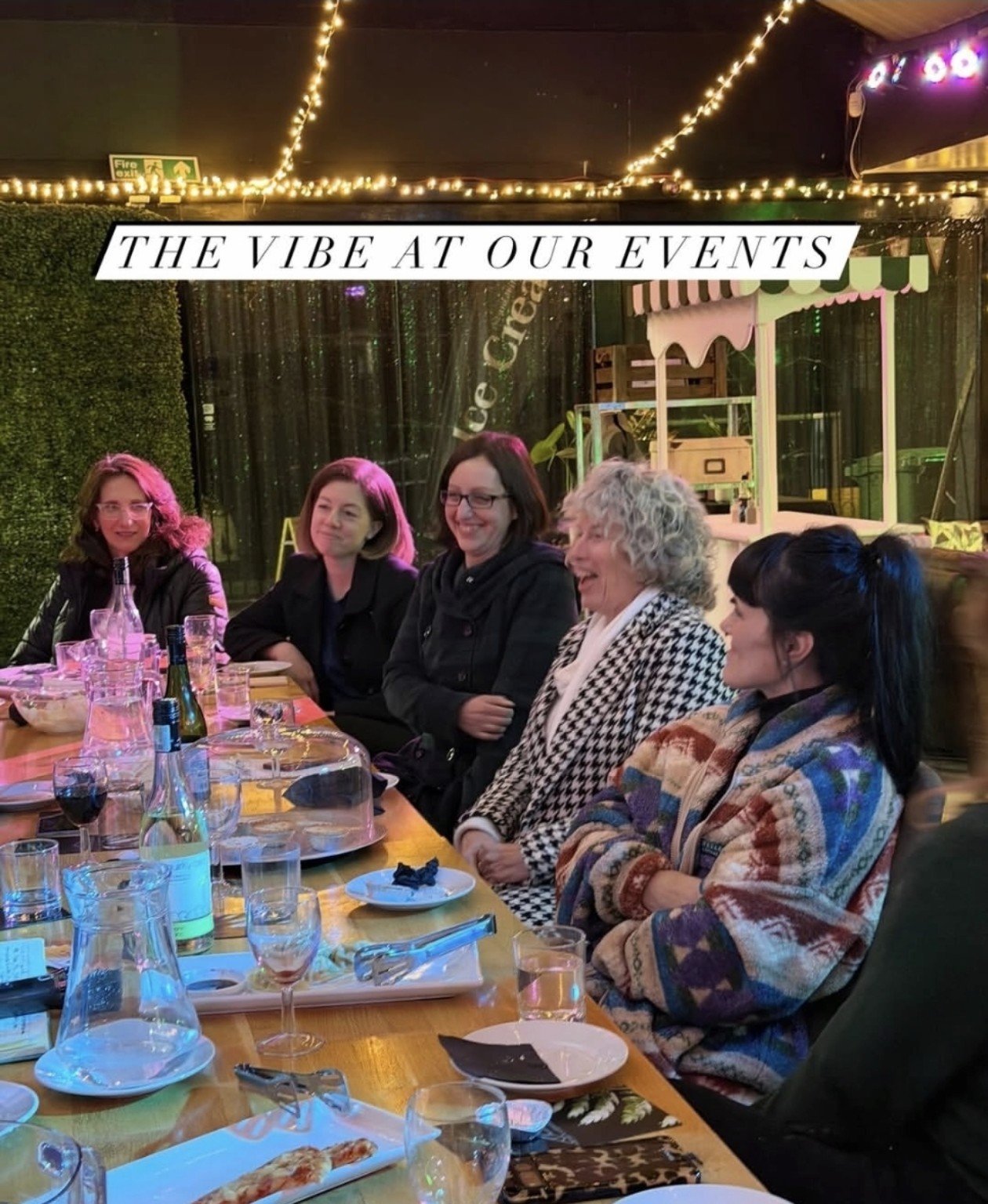 Women gathered around the table at an A Seat at the Table event